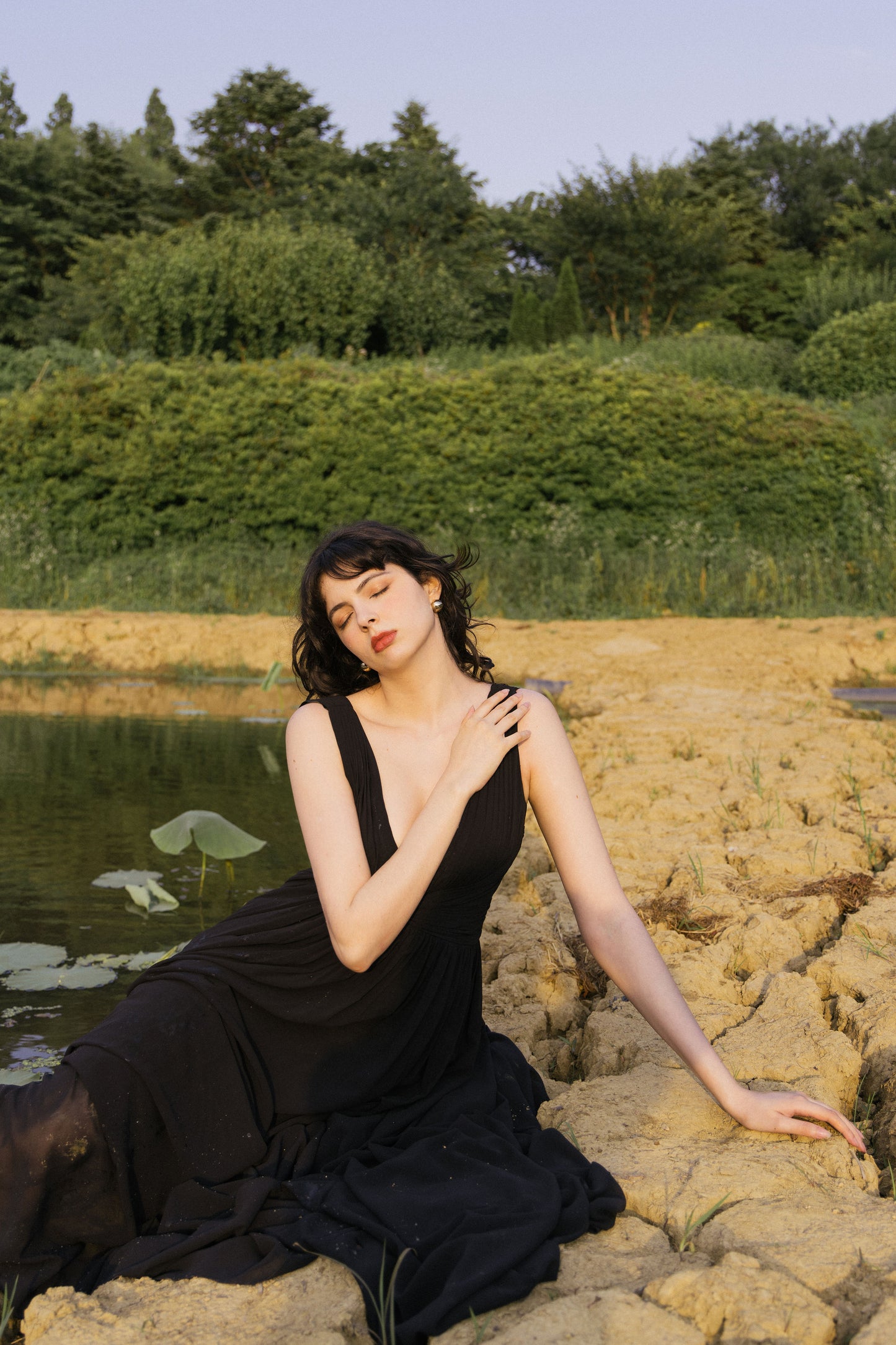 Deep V-neckline Black Ruched Party Gown